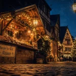 Marché de noel alsace : rue illuminée et chalet en bois