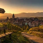 Que faire en alsace en ete : vignes et village à Riquewihr au coucher du soleil